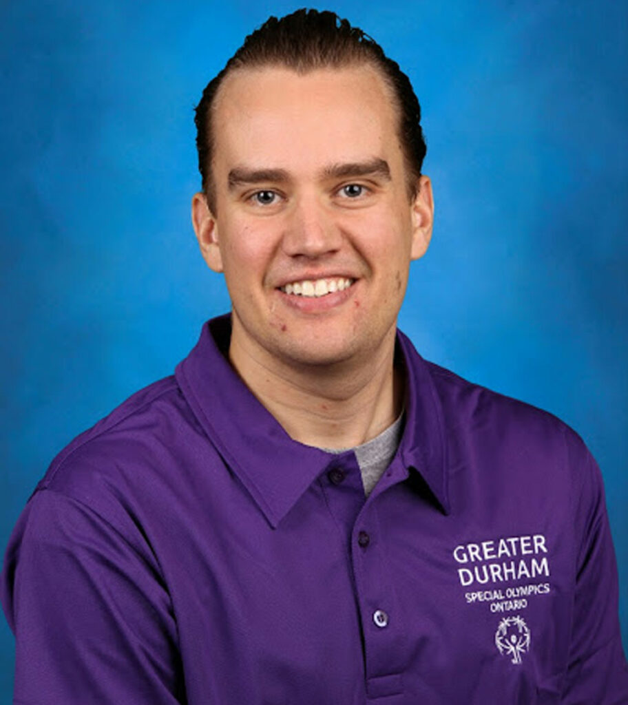 Smiling Justin Heenan portrait photo