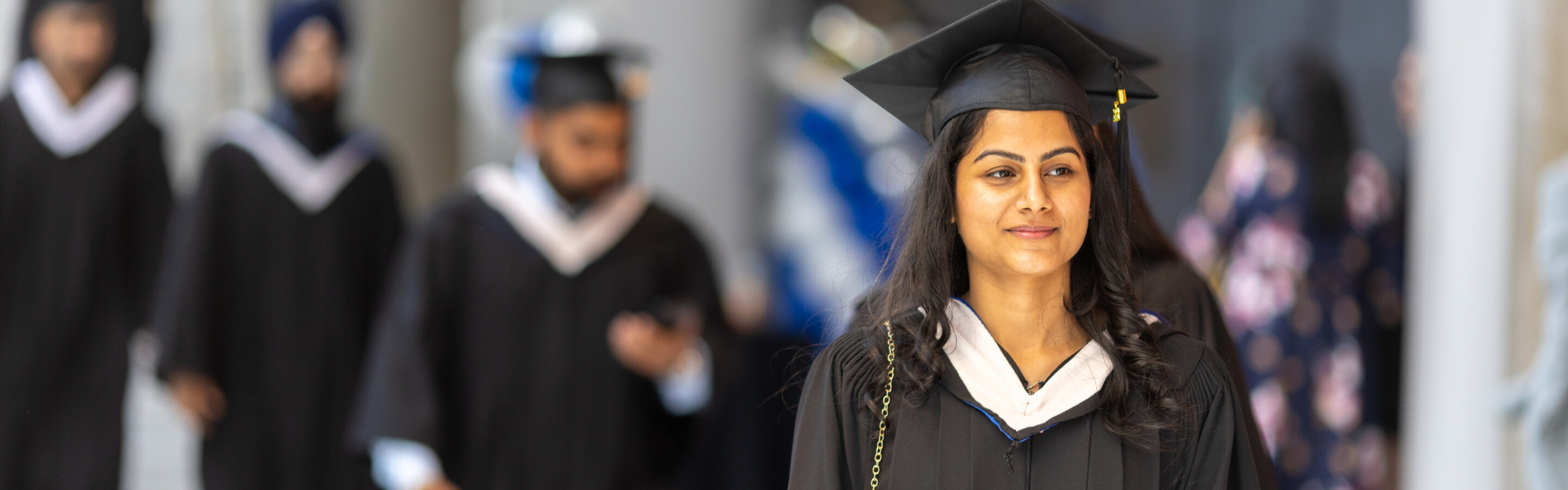 Graduates walking in a line